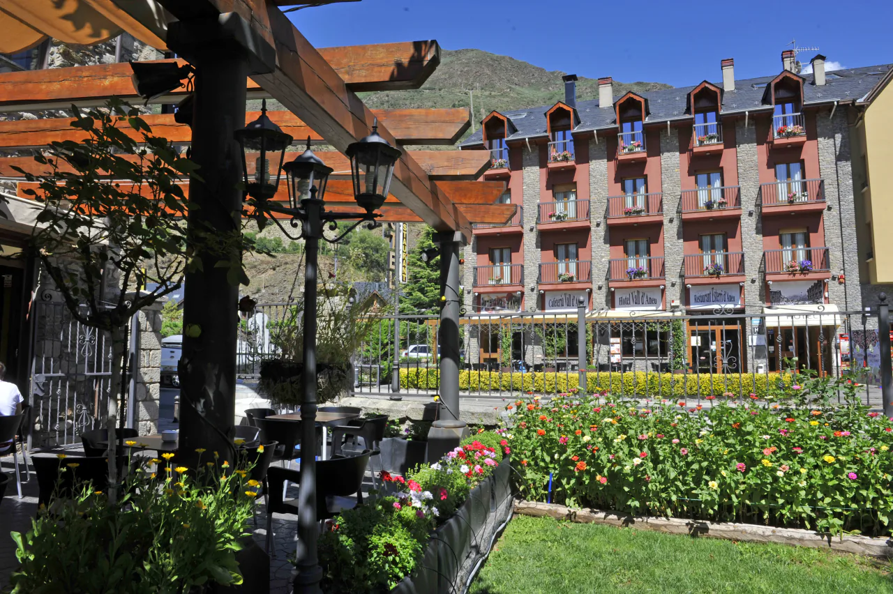 The house's garden with the mountain behind